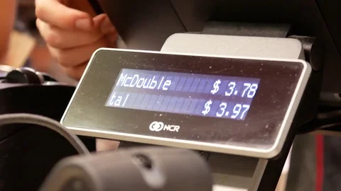 Motion of people buying hamburger on display screen machine Stock Footage 80448385