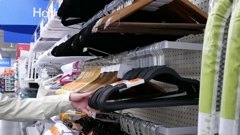 Motion of people buying hanger inside Walmart store with 4k resolution Stock Footage 87620357