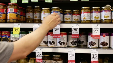 Motion of people buying olives inside price smart foods store with 4k resolution Stock Footage 108014683