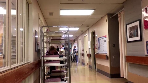 Motion of people at dining area inside Eagle Ridge hospital Video stock 71696784