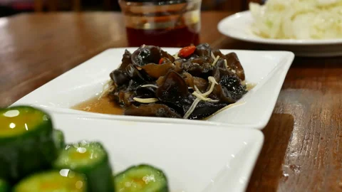 The motion of people eating appetizers on a table 스톡 동영상 167658736
