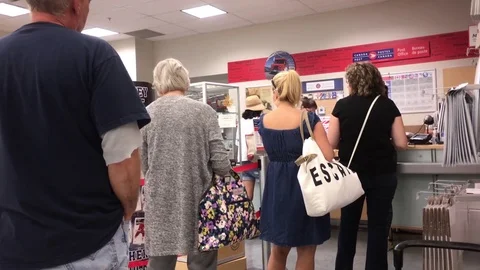 Motion of people line up for taking parcel at post office Stock Footage 79288806