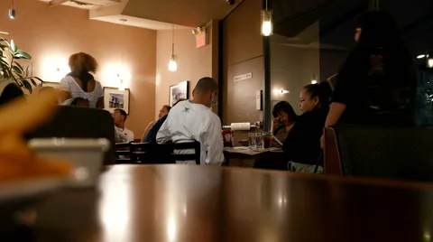 Motion of people ordering foods inside Denny's restaurant Video stock 68110109