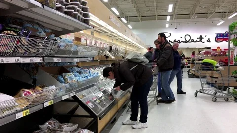 Motion of people picking fod at bulk foods section inside superstore Stock Footage 70974804
