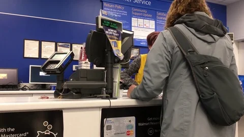 Motion of people returning items at customer service counter inside Walmart 스톡 동영상 83946304