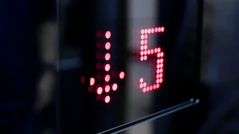 Motion of people taking elevator from five to one floor Stock Footage 83769100