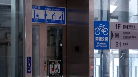 Motion of people taking elevator at park with 4k resolution. Stock Footage 84659797