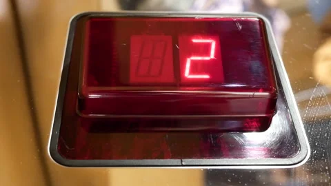 Motion of people taking elevator from two to six floor Stock Footage 96133096