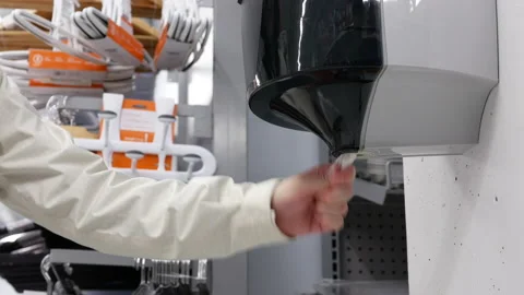 Motion of people taking napkins for cleaning hand inside Walmart store Stock Footage 124366405