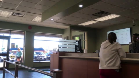 Motion of people talking to the teller inside TD Bank with 4k resolution Stock-Footage 105046934