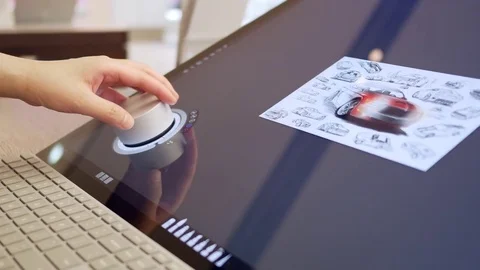 Motion of people trying new surface studio computer at Microsoft store Stock Footage 79022502