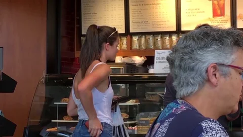 Motion of people waiting for ordering food and chatting with friend Stock Footage 79086366