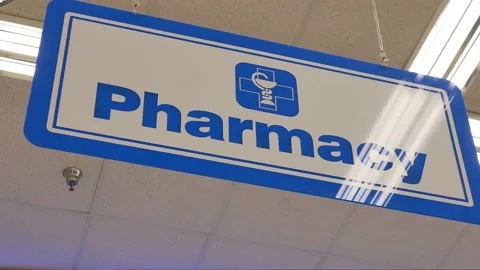 Motion of pharmacy sign inside London drugs store with 4k resolution Stock Footage 90207708