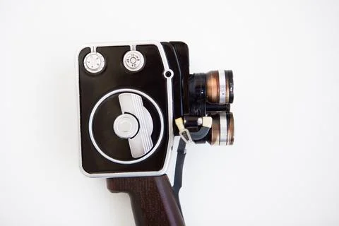 Motion picture camera on the white background. Vintage black ginder Foto stock