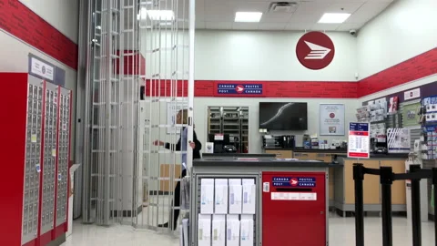 Motion of post office closing at night inside Coquitlam center mall Video stock 93534833