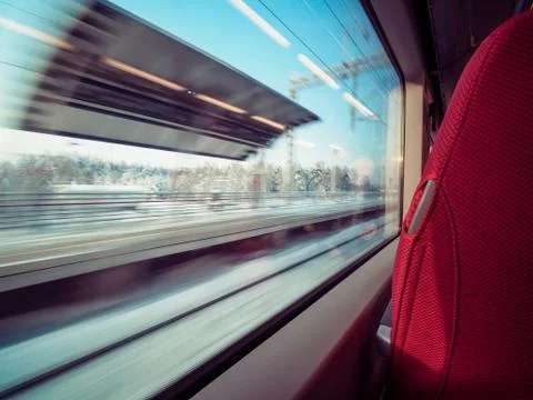 Motion railway platform through window railway car 스톡 사진