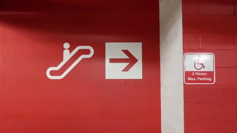 Motion of red escalator sign on wall with 4k resolution Stock Footage 115479692