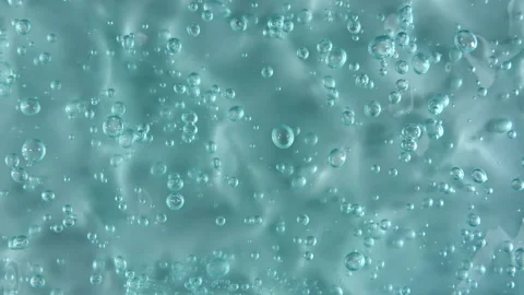 Motion, rotation of the liquid gel fluid, blue cosmetic cream texture with Vídeo Stock 149770973