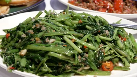 Motion of sauteed vegetable in ginger sauce inside Thailand restaurant Stock Footage 98274964