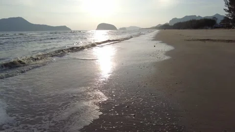Motion sea wave on sand beach at sunlight background. Nature wave motion back Stock Footage 145067054