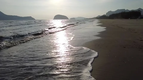 Motion sea wave on sand beach at sunlight background. Nature wave motion back Stock Footage 145068584