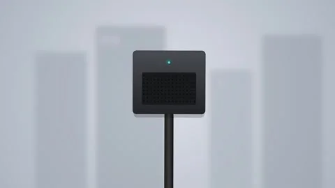 Motion sensor device with glowing indicator light and speaker grill on a po.. Stock Footage 345694084