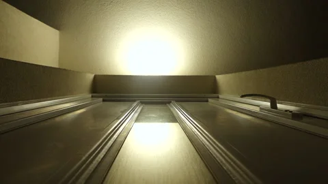 A motion sensor light turns on and off above the front door Vídeo Stock 220841288