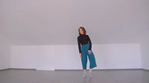 Motion shoot of young beautiful skilled female performing an emotional dance Stock Footage 110276951