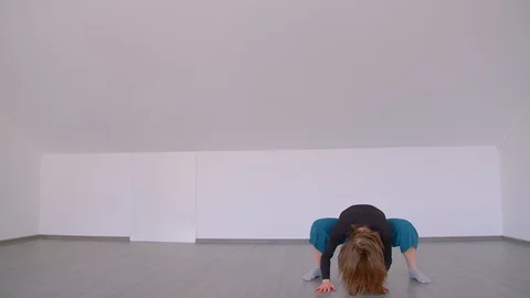 Motion shoot of young beautiful skilled female performing an emotional dance in Stock Footage 110277320