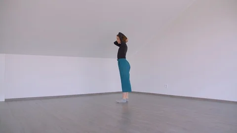 Motion shoot of young beautiful talented female performing an emotional dance in Stock Footage 110278323