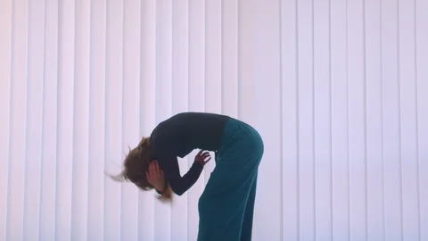 Motion shoot of young cute flexible female performing an emotional dance in the Stock Footage 110282014