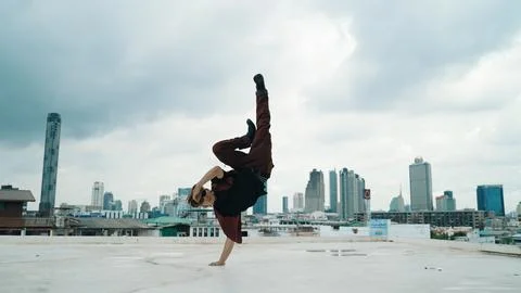 Motion shot of B-boy dance performance by professional street dancer. Endeavor. 库存照片
