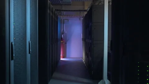 Motion shot of dark database corridor and equipment racks working on modern Video stock 164423516