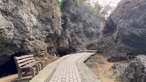 Motion shot of going through hiking cave trail. 4k Stock Footage 270156945