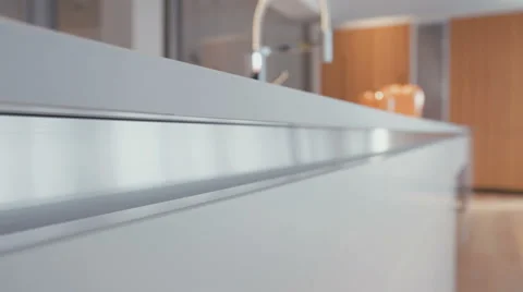 Motion shot of the side of a kitchen granite surface Stock Footage 63499597