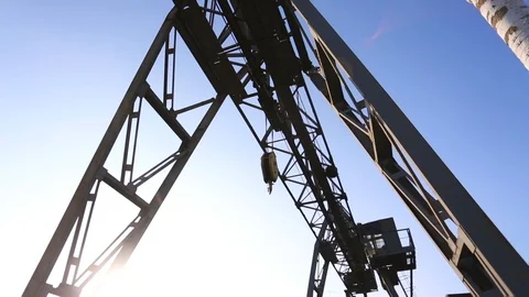 Motion simulating steps past a rusty metal structure in abandoned industrial Видео 117096895