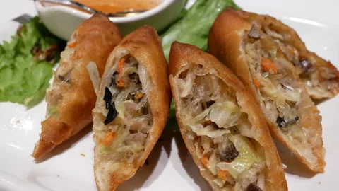 Motion of spring roll and sauce on table inside Thailand restaurant Stock Footage 95820217