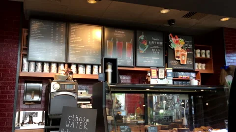 Motion of Starbucks menu on wall Stock Footage 62900859