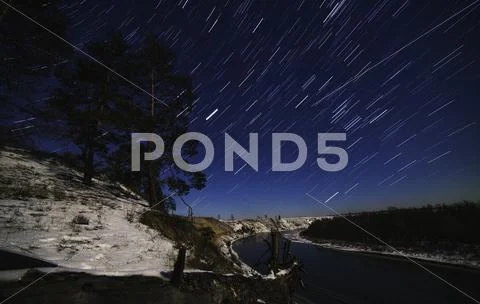 Motion of the stars in the night sky Stock Photos