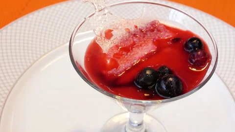 Motion of strawberry mousse on table inside restaurant with 4k resolution. Stock Footage 97042520