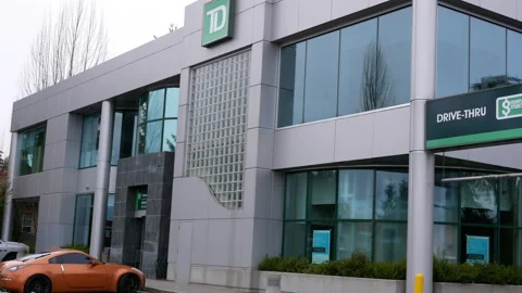 Motion of TD Canada Trust branch with drive thru sign with 4k resolution Stock Footage 108758780