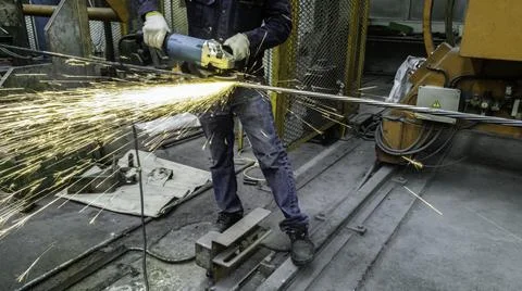 Motion of technician are cutting pipe, Electricity spark from chainsaw, Risk  Stock Photos
