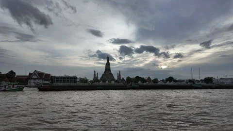 Motion time-lapse of boats sailing past Wat Arun Stock Footage 292764960