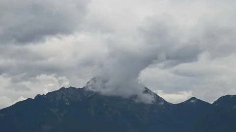 Motion time lapse cloud formations formed by vaporizing air Stock Footage 135605421