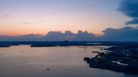 Motion time-lapse drone shot of dusk clouds moving over Kruunuvuorensilta bridge Stock Footage 337202743