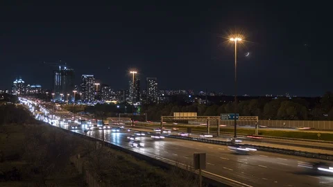 Motion time lapse of night time busy city highway 2 Stock Footage 90088393