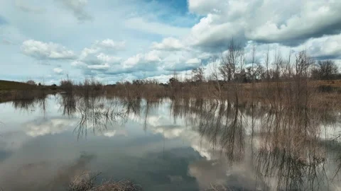 Motion time lapse over a flooded field Stock Footage 282333516