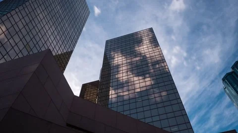 Motion time-lapse panning up at skyscrapers. Filmed in 4k. Stock Footage 43280525
