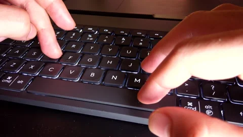 Motion time lapse of a person typing on keyboard | freelance  work from home Stock Footage 146671194