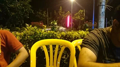 Motion time lapse of small and young family hanging out and having night meals Stock Footage 41738733